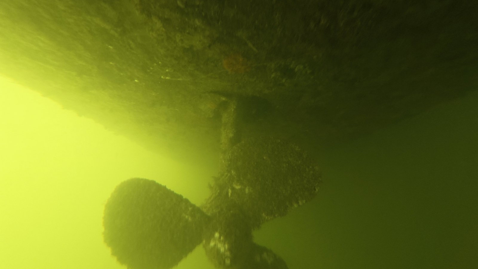Diver performing underwater hull cleaning in Fort Lauderdale, FL