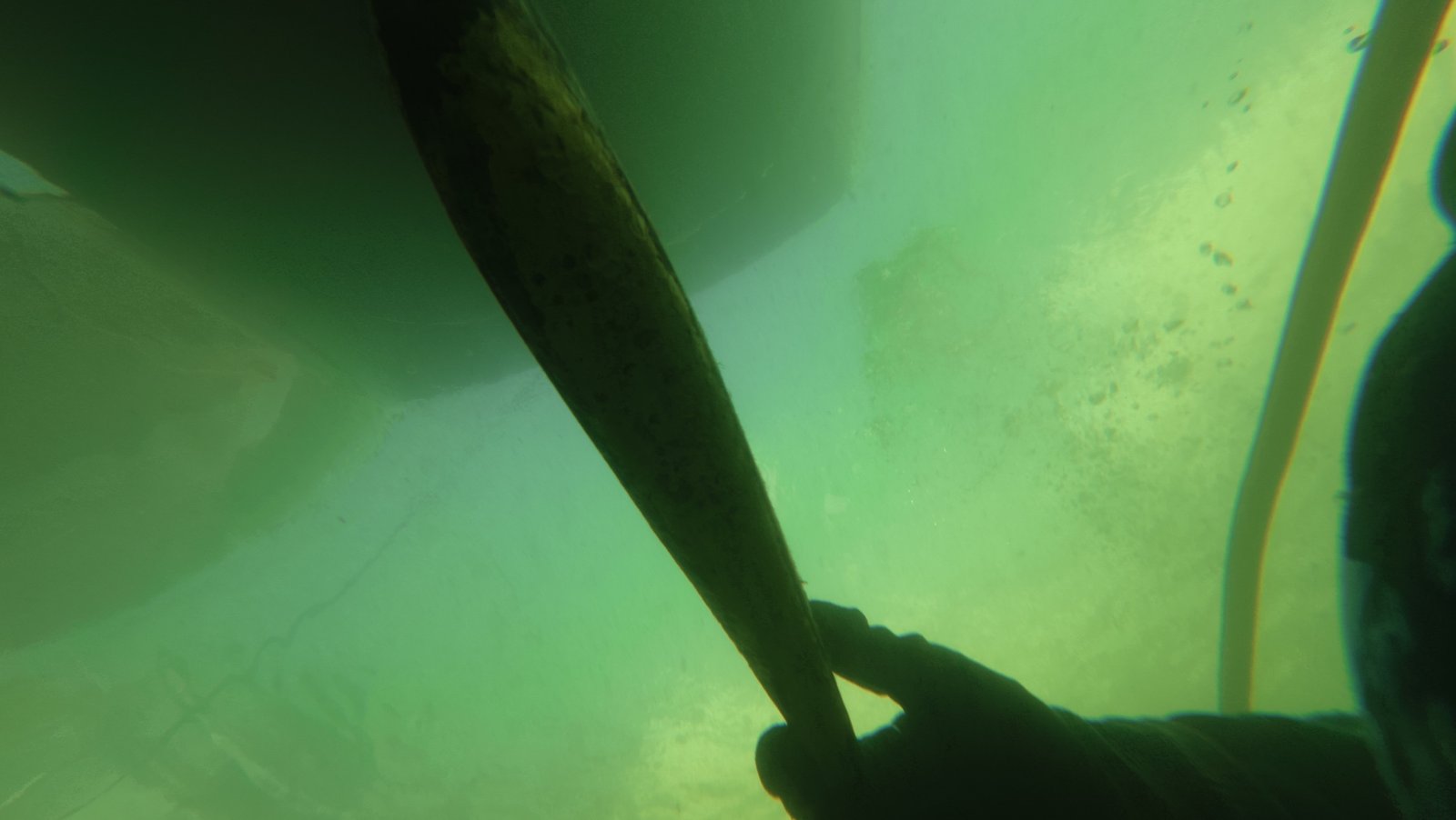 Underwater intake and thru-hull cleaning on a boat in Palm Beach Gardens, Florida