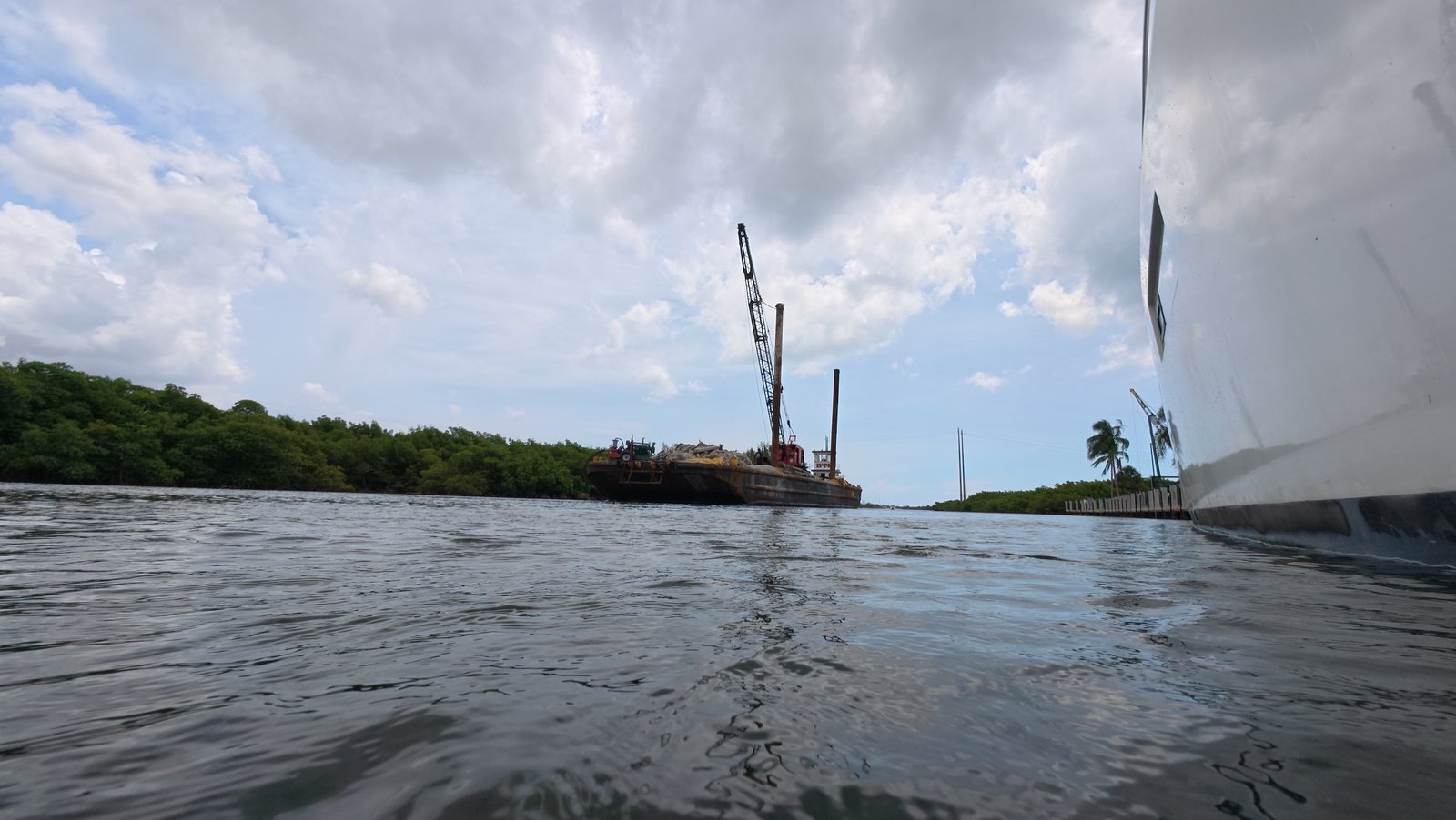 Underwater hull cleaning for a superyacht at Museum Park Marina, Miami, FL